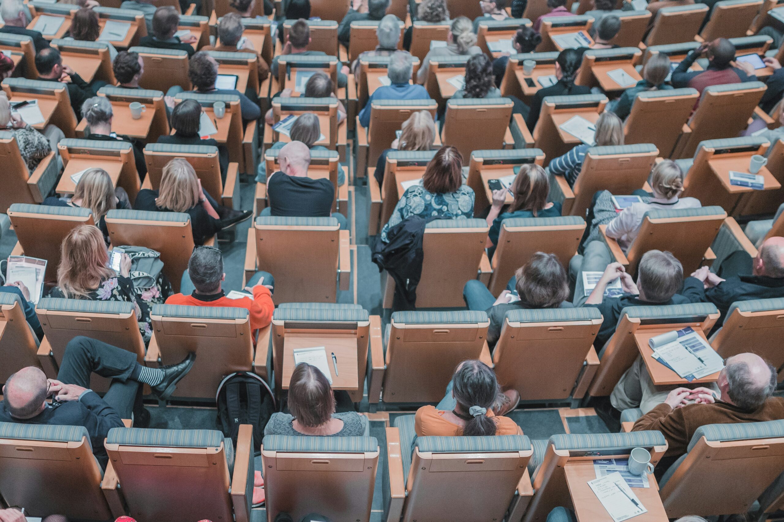 A lecture hall from above filled with students