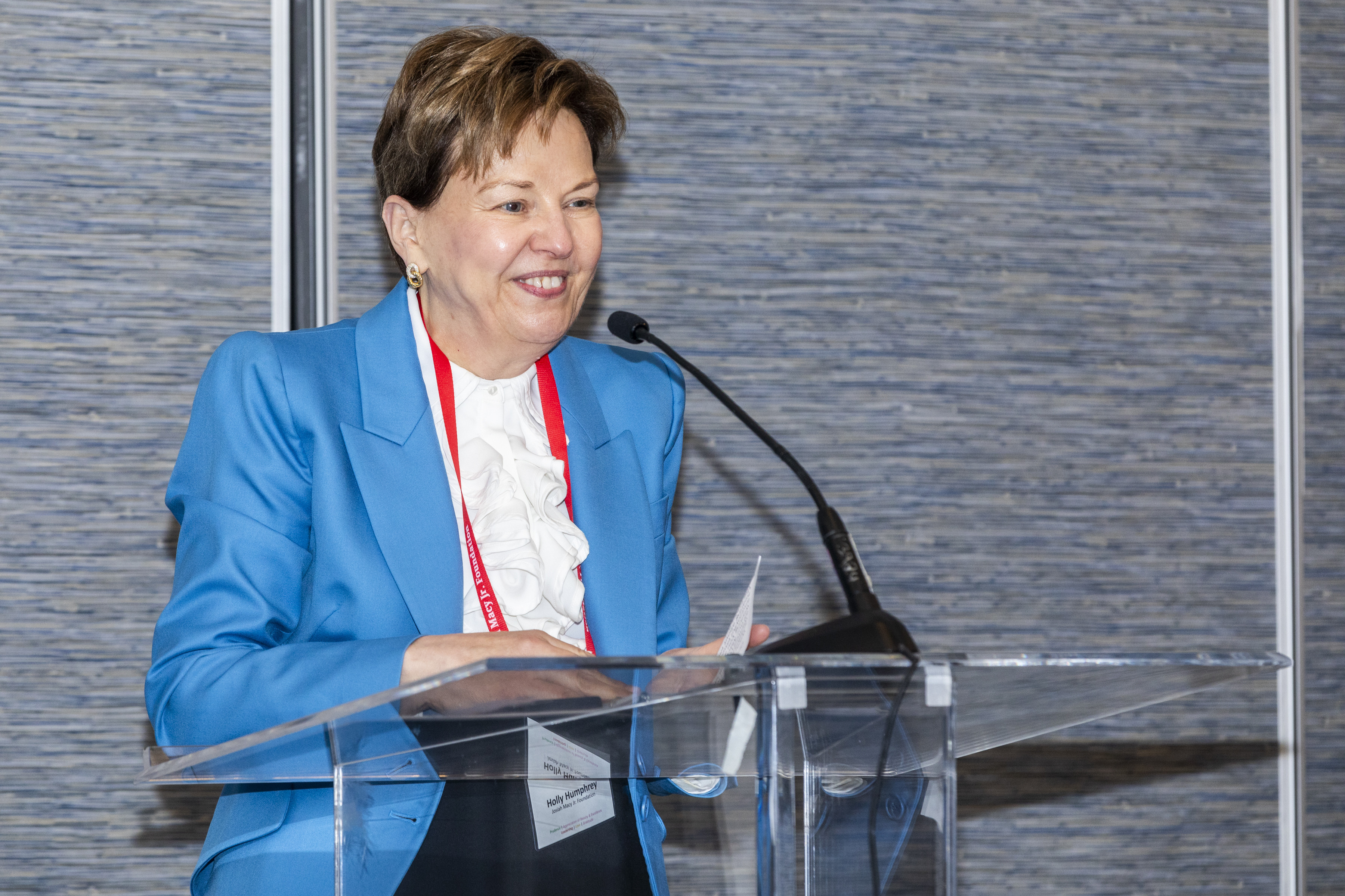 Macy Foundation President Holly J Humphrey at a podium