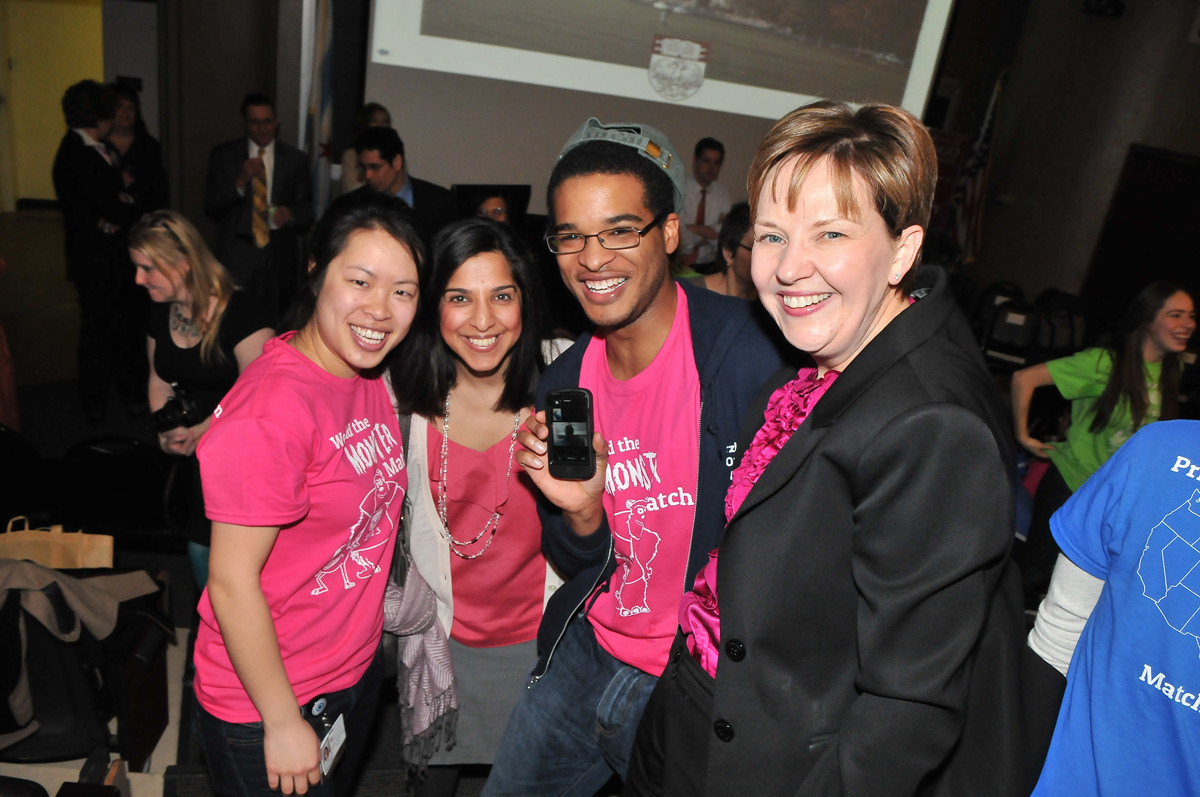 Dr. Holly Humphrey pictured with faculty and students at The University of Chicago.